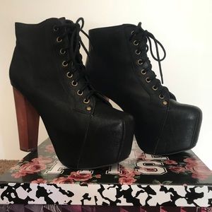 A pair of Jeffrey Campbell Lita boots.